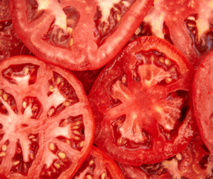Homegrown red ripe sliced tomatoes.