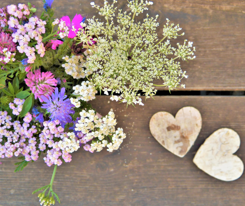 Dainty colorful flowers and 2 seed paper hearts for you favorite gardener.