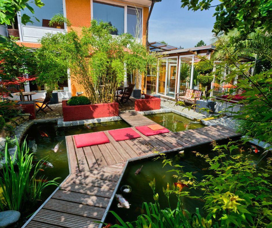 Modern style pond featuring multiple deck, bright colors and large container plants