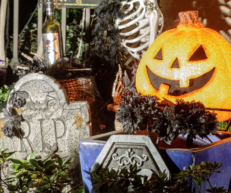 Garden decor ideas for Halloween, gravestones, skeletons, pumpkins and creepy flowers!