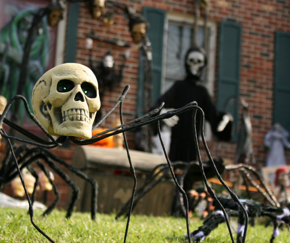 Creative Halloween Spider Decor featuring a spider with a skeleton head.