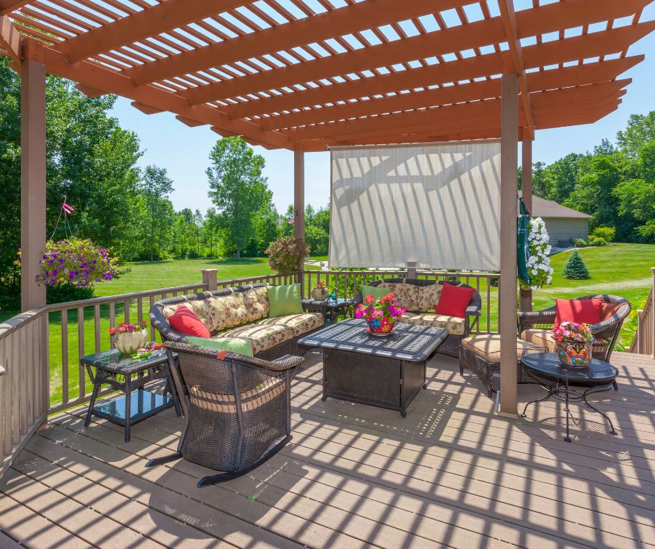 Super simple outdoor curtain hanging from patio to provide shade from afternoon sun.
