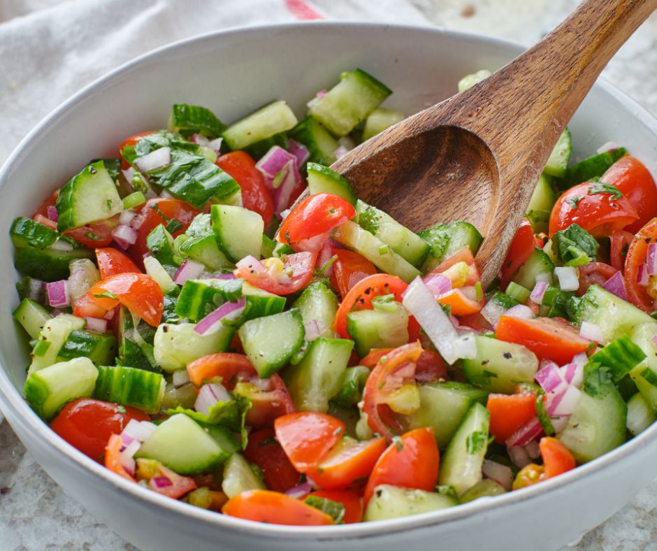 A cucumber, tomato, and red onion salad.