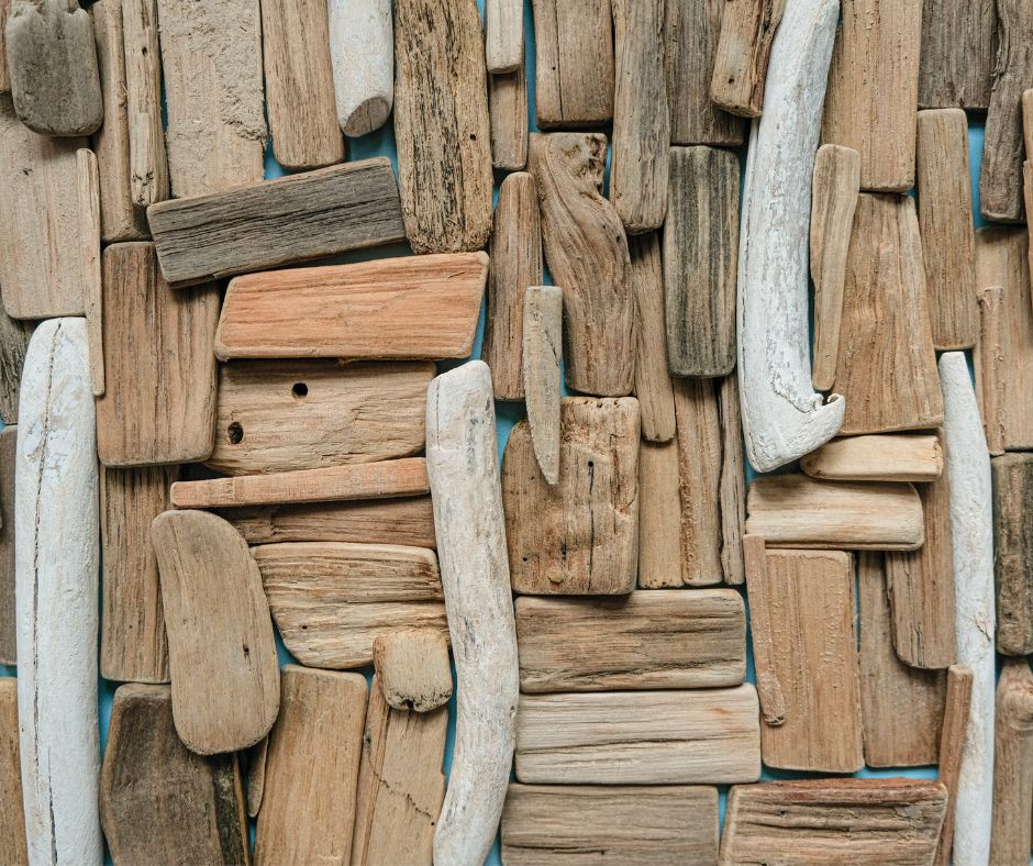 Driftwood of varying shape, size, and color made in an art wall.