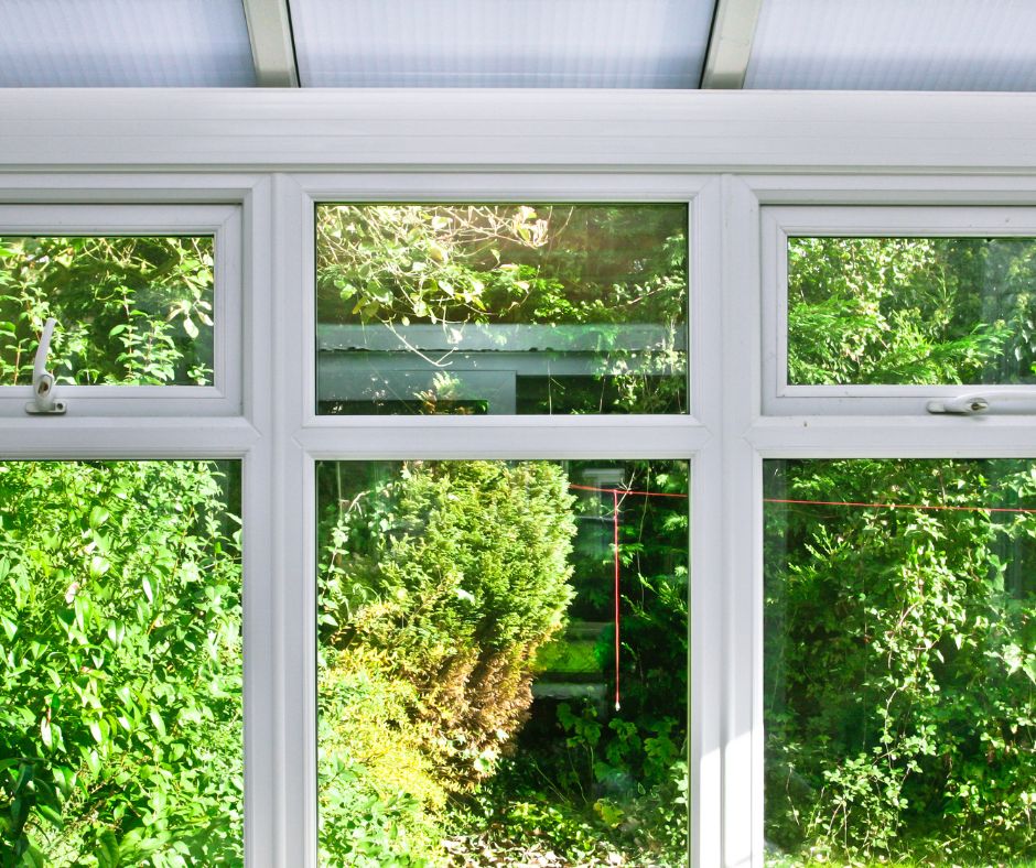 Windows that allow warm air to escape from the top of white frame.
