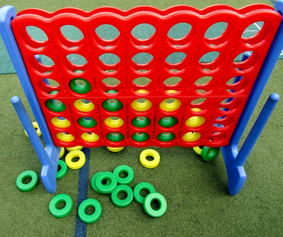 A brightly colored oversized outdoor game set.