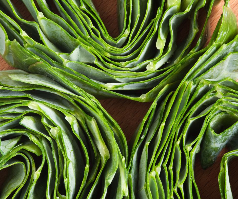 Thinly sliced collard green leaves ready to cook.