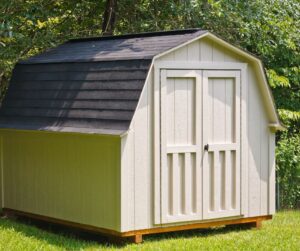 A tan barn style backyard shed.