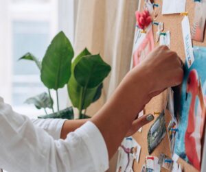 A person creating a relaxing vision board for the new year.