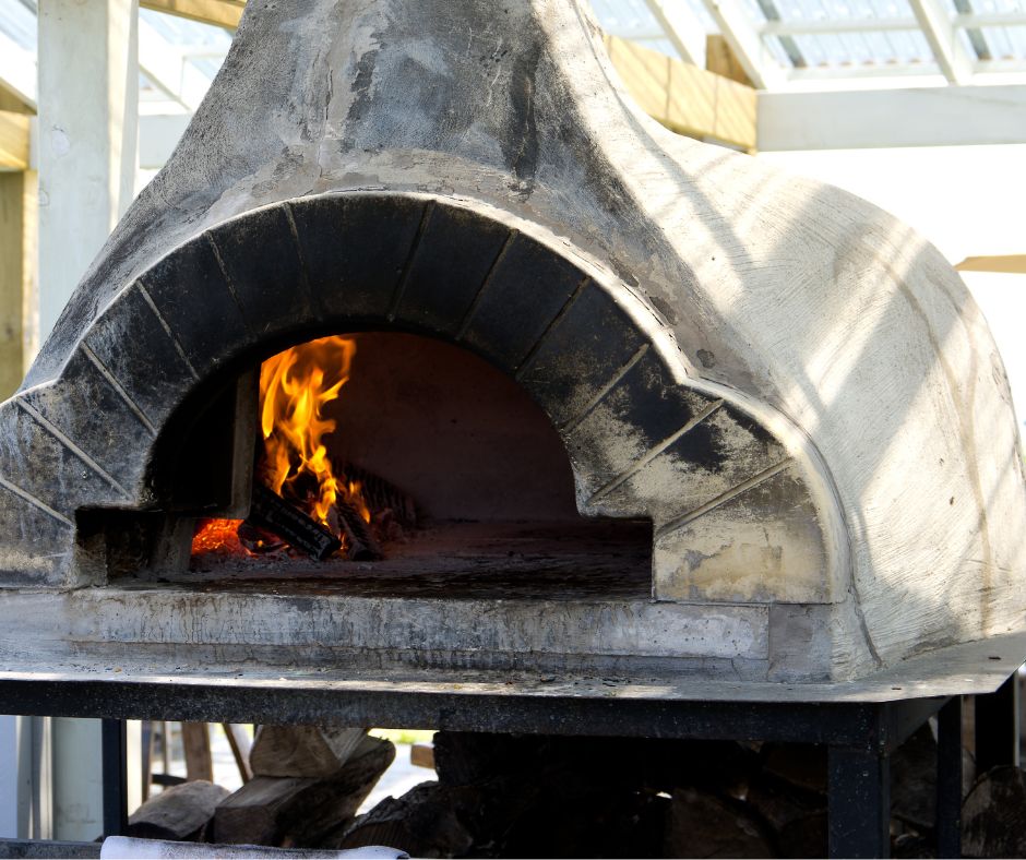 A large outdoor pizza oven for alfresco dining.