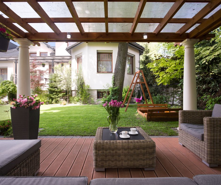 An outdoor living area protected by a pergola.