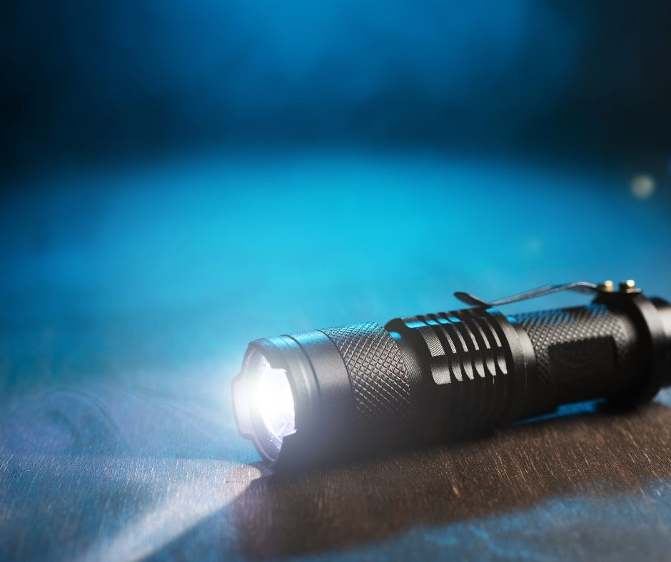 A small black safety flashlight.