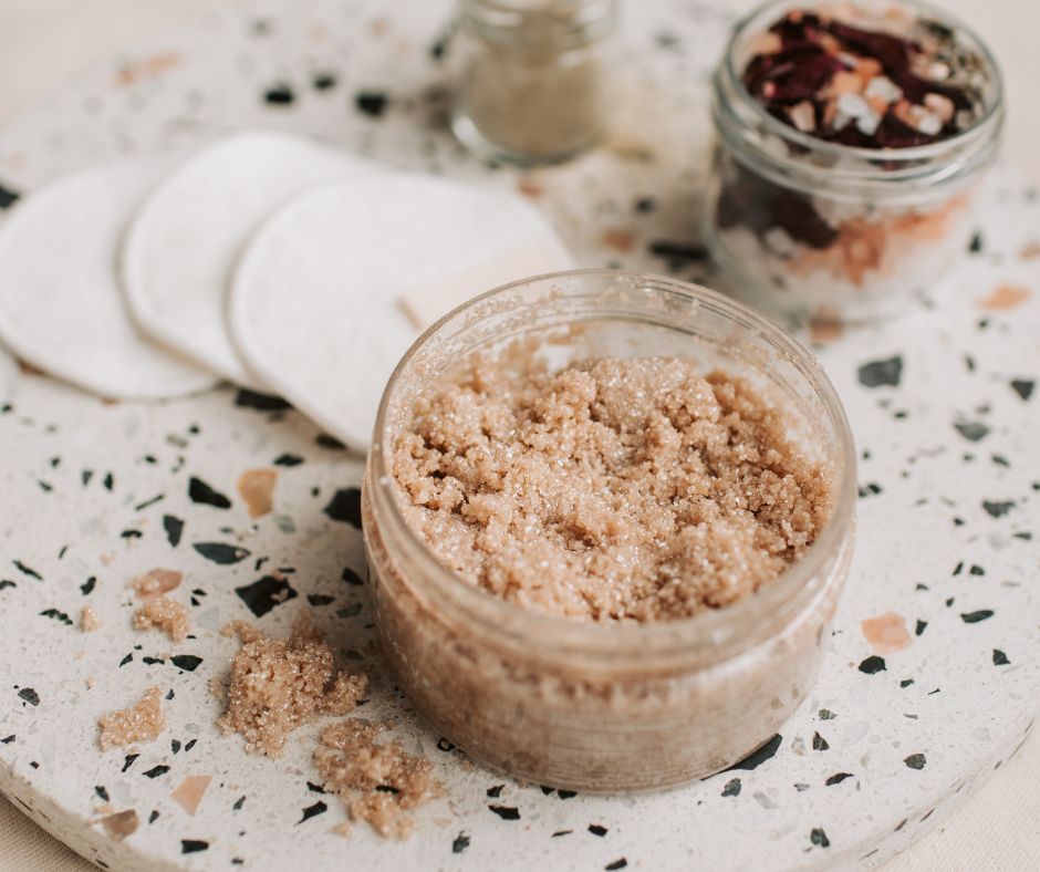 A glass jar of natural homemade lip scrub.