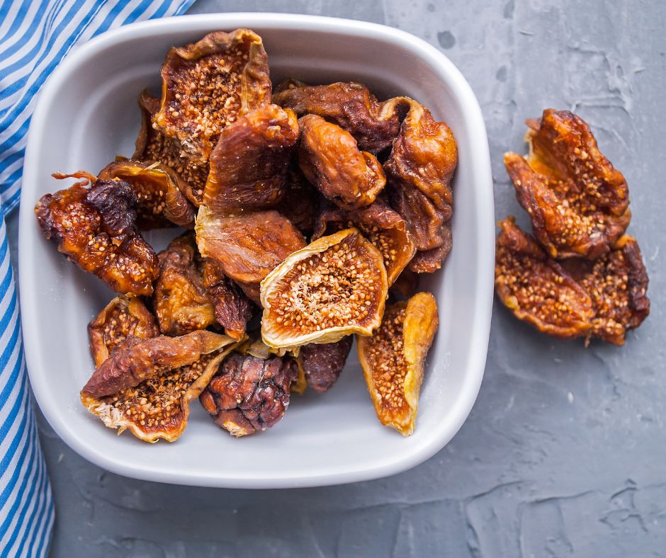 A white bowl of dried figs.