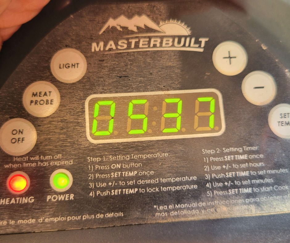 The control panel for an Masterbuilt backyard electric smoker.
