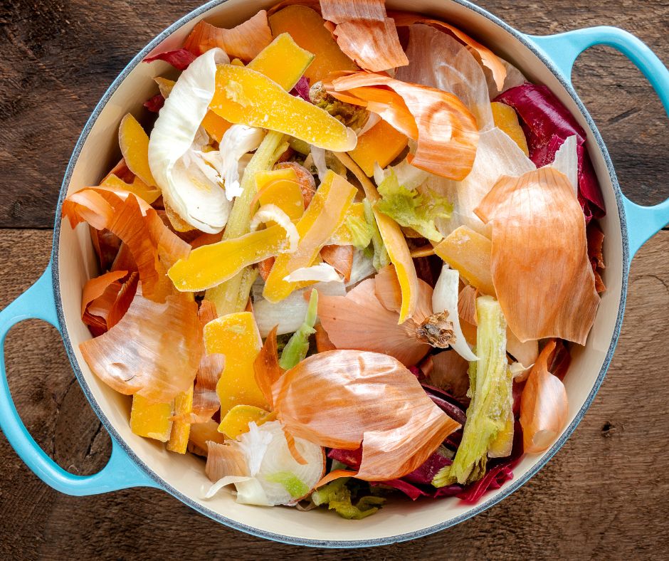 A pot of vegetable scraps ready for making stock.