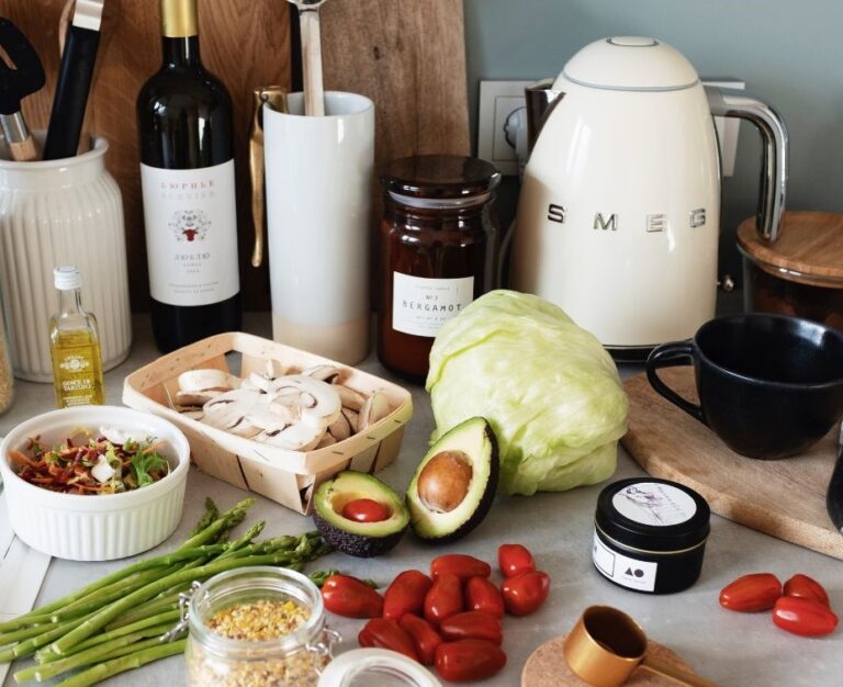 Garden fresh ingredients and SMEG appliances on a kitchen counter