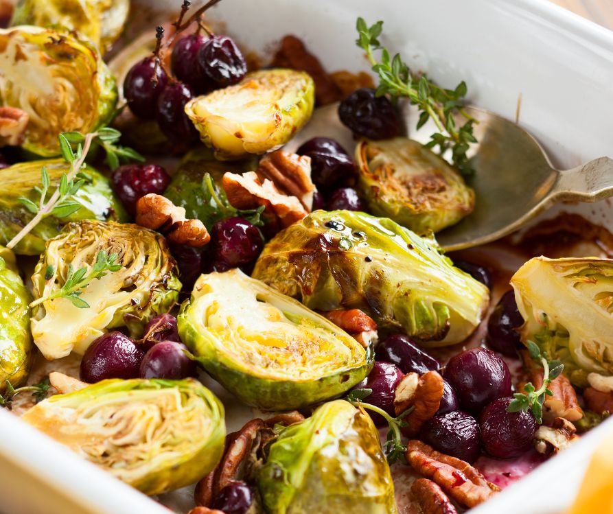 Roasted brussels sprouts with herbs and cranberries.