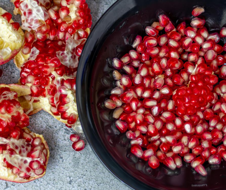Fresh Pomegranate seeds ready for use in recipes.