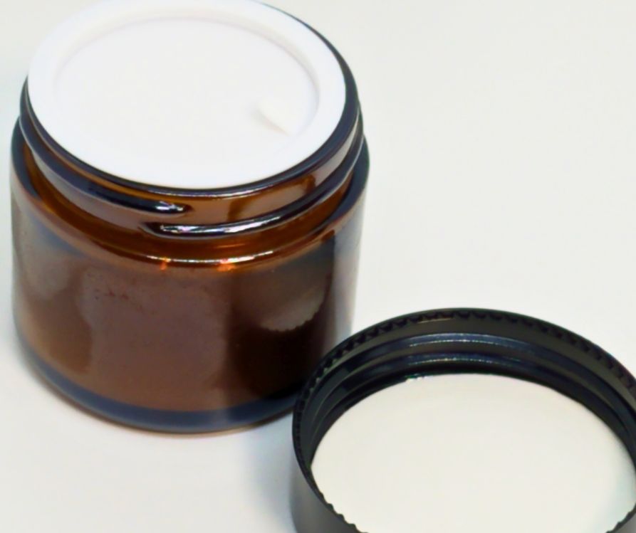 An amber glass jar with fresh seal.