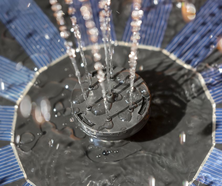 Water spraying out of a floating water fountain.