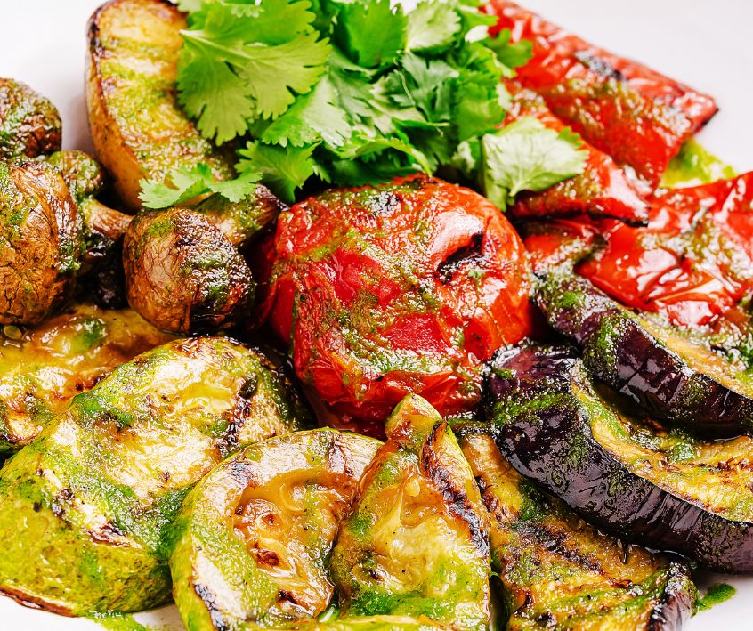 Grilled tomatoes, eggplants, and peaches.