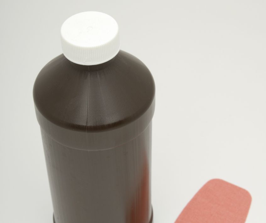 A brown bottle of hydrogen peroxide.