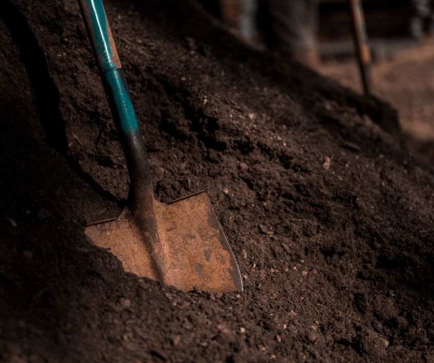 Shovel on Pile of Soil for raised garden beds.
